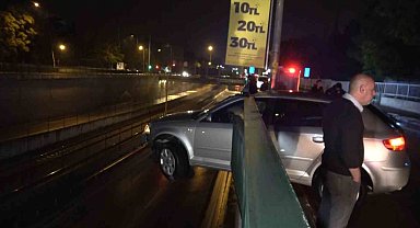 Bursa'da kontrolden çıkıp bariyerlere saplanan otomobil 5 metre yükseklikte asılı kaldı