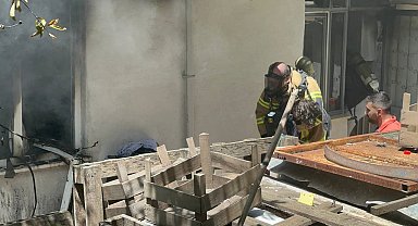 Alevlerin arasından 2 çocuğu kurtardılar