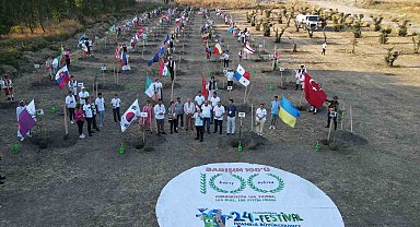100 ülkenin gençleri dünya barışı için 100 zeytin fidanı dikti
