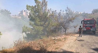 Antalya'da çöp dökülen alandaki yangına helikopterle müdahale edildi