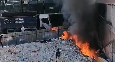 İstanbul'da yangına bir garip müdahale kamerada: Biri taş attı diğeri rüzgarla savaştı