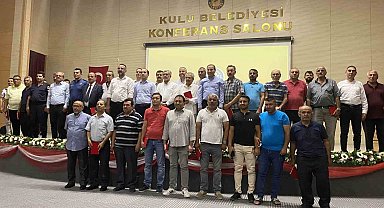 Kulu'da 25 yılını dolduran esnaflara plaket