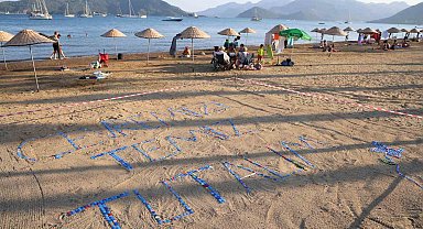 Marmaris'te plastik kapaklarla çevre mesajı verildi
