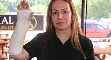 Pitbullun saldırısından köpeğini kurtaran kadın kaldırıma düşüp kolunu kırdı