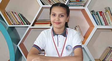 Küçük kız 23 sayfa kitabı 20 dakikada okuyarak dünya şampiyonu oldu