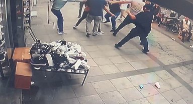 Kavga eden iki esnafı ayırmaya çalışırken vuruldu