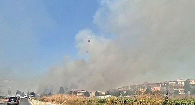 Silivri'de otluk alanda çıkan yangına havadan müdahale ediliyor