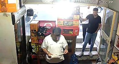 Ümraniye'de dükkanlardan vergi levhası parası isteyen şahıslar yakalandı