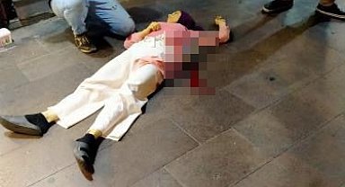 Tartıştığı eşini sokakta bıçakladı, linçten polis kurtardı